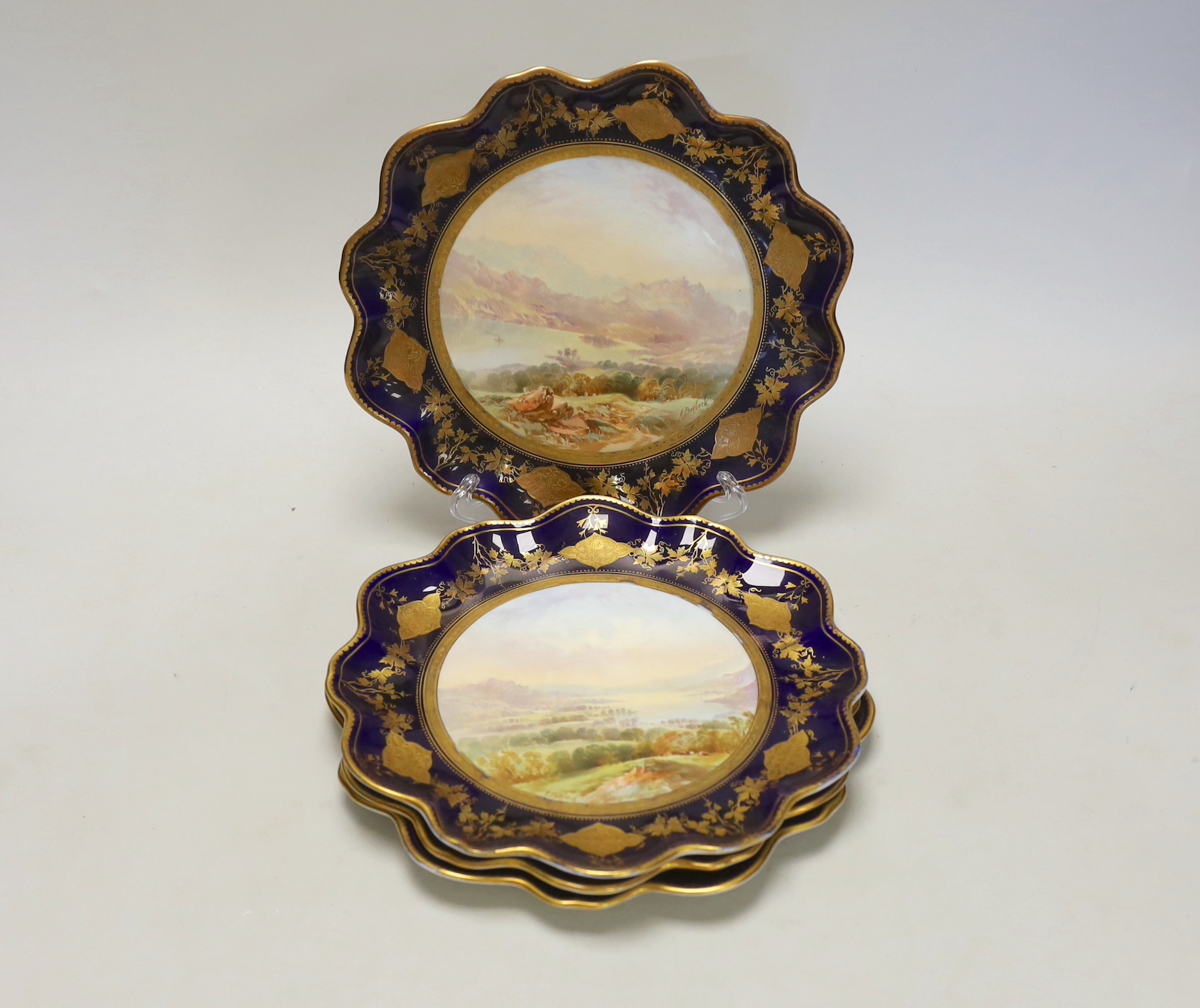 A set of four Victorian bone china cabinet plates, each painted with a named view by J Birbeck